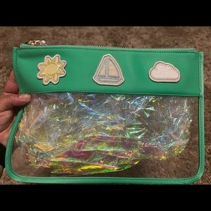 Stoney Clover Lane flat pouch in avocado color with 3 patches.